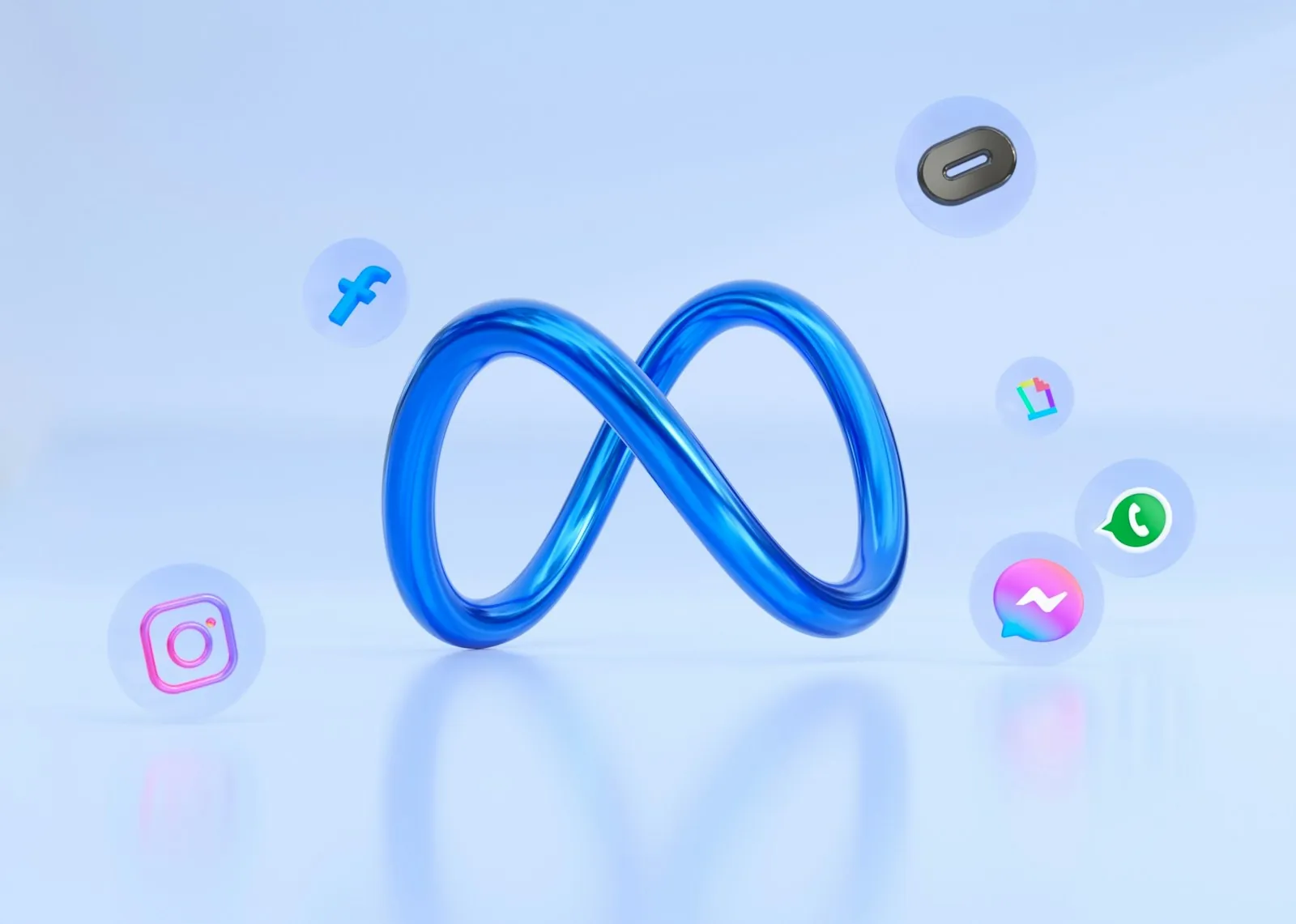 Çevresinde Facebook, Instagram ve WhatsApp simgeleri bulunan mavi Meta logosu